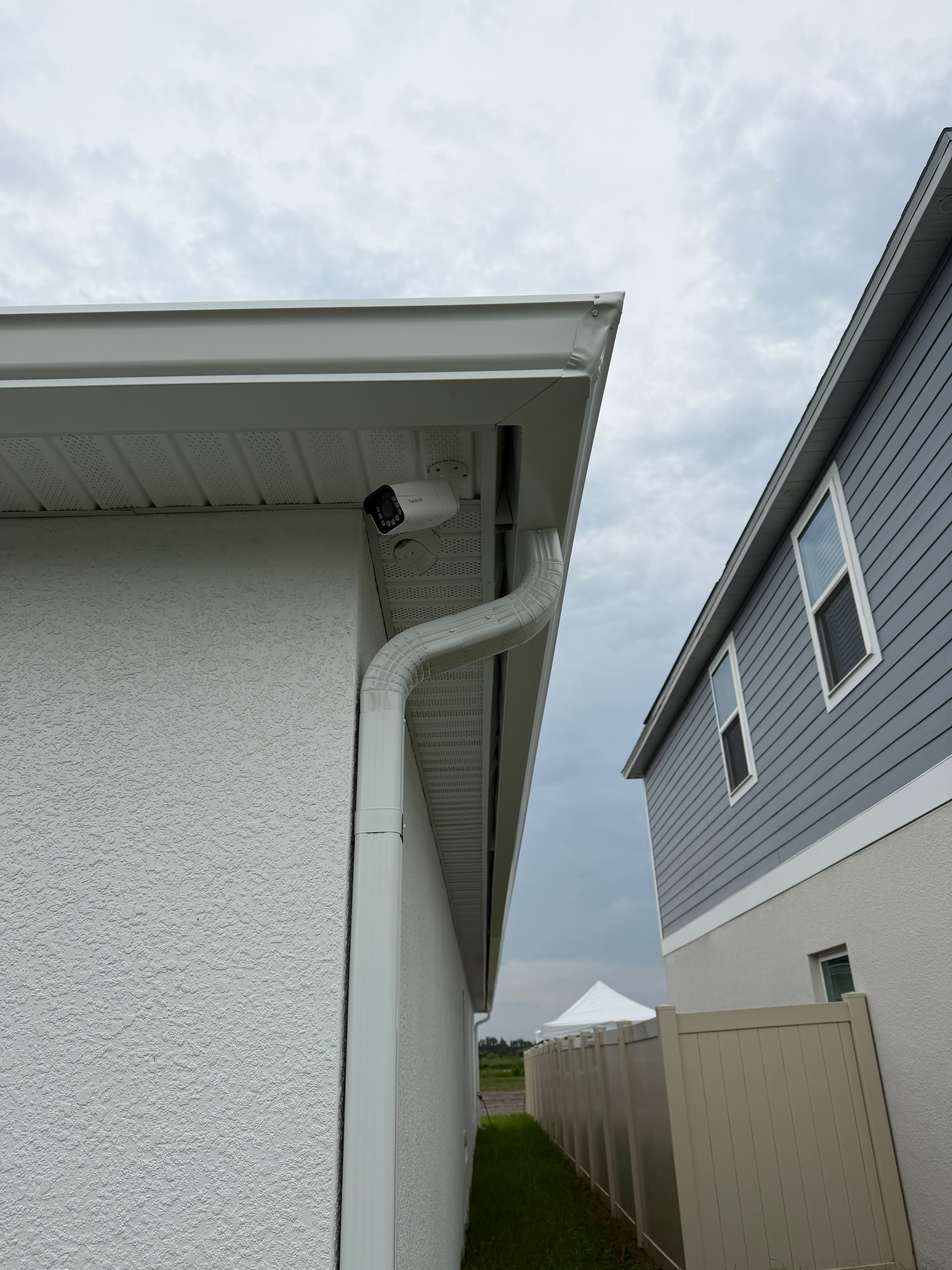 Oversized downspout installed at a Florida home corner